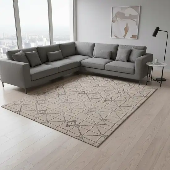 Ivory And Brown Geometric Area Rug Photo 1