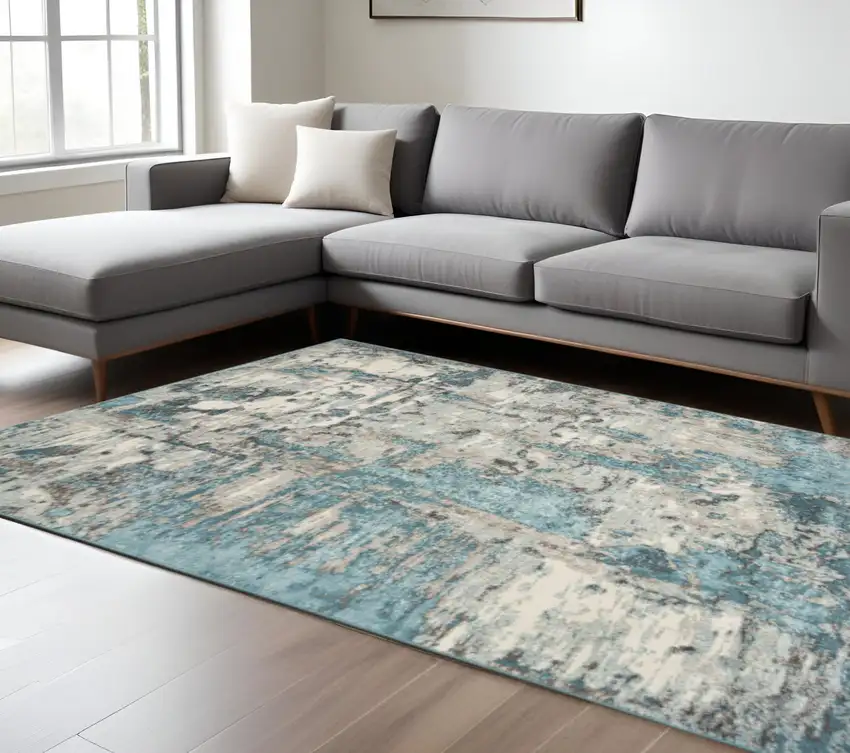 Ivory And Teal Abstract Area Rug Photo 1