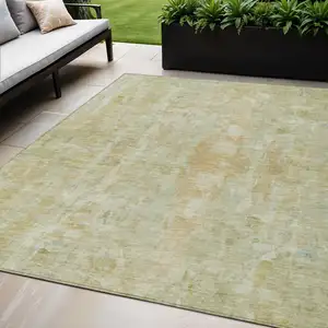 Photo of Key Lime And Copper Abstract Washable Indoor Outdoor Area Rug