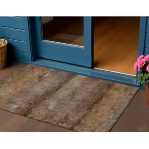 Photo of Khaki And Brown Abstract Washable Indoor Outdoor Area Rug