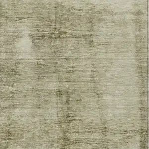 Photo of Khaki And Ivory Abstract Washable Indoor Outdoor Area Rug