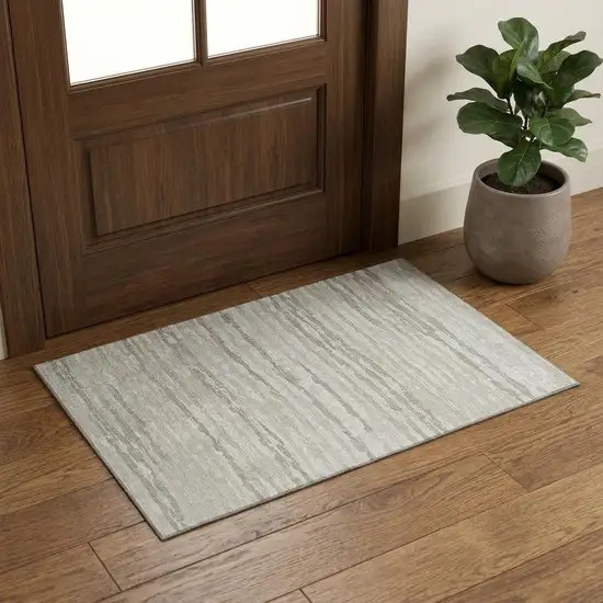 Ivory And Khaki Abstract Distressed Washable Area Rug With UV Protection Photo 1