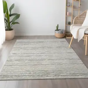Photo of Khaki And Ivory Striped Washable Area Rug With UV Protection