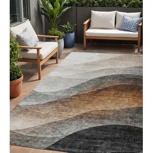 Photo of Khaki Black And Terra Cotta Abstract Washable Indoor Outdoor Area Rug