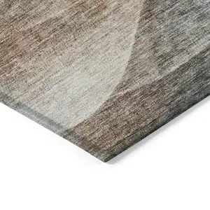Photo of Khaki Black And Terra Cotta Abstract Washable Indoor Outdoor Area Rug