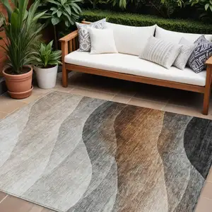Photo of Khaki Black And Terra Cotta Abstract Washable Indoor Outdoor Area Rug