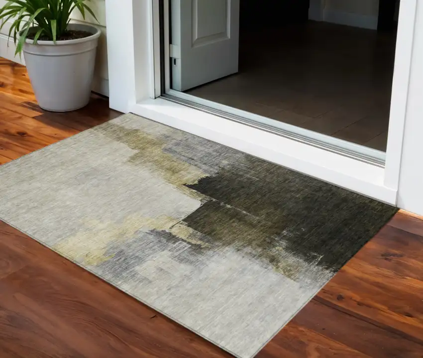 Khaki Light Green And Black Abstract Washable Indoor Outdoor Area Rug Photo 1