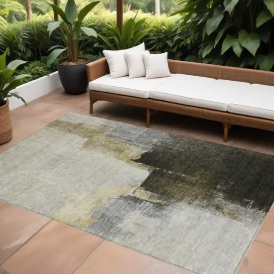 Khaki Light Green And Black Abstract Washable Indoor Outdoor Area Rug Photo 1