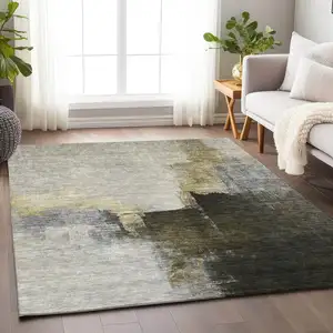 Photo of Khaki Light Green And Black Abstract Washable Indoor Outdoor Area Rug
