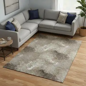 Photo of Latte Ivory And Gray Geometric Washable Area Rug With UV Protection