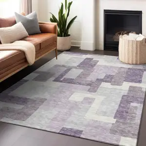 Photo of Lavender And Ivory Abstract Geometric Washable Area Rug With UV Protection