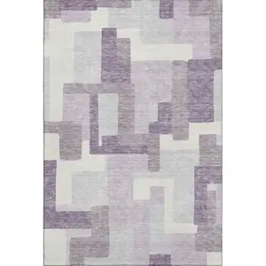 Photo of Lavender And Ivory Abstract Geometric Washable Area Rug With UV Protection