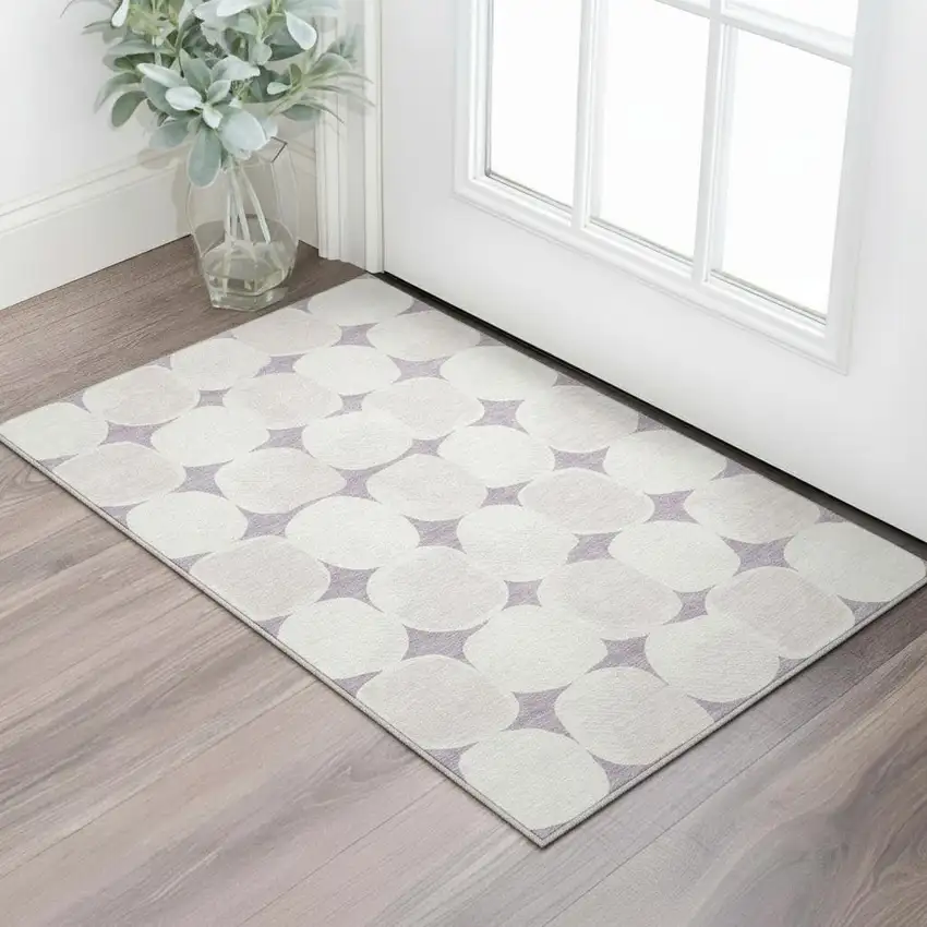 Lavender And Ivory Abstract Geometric Washable Area Rug With UV Protection Photo 1