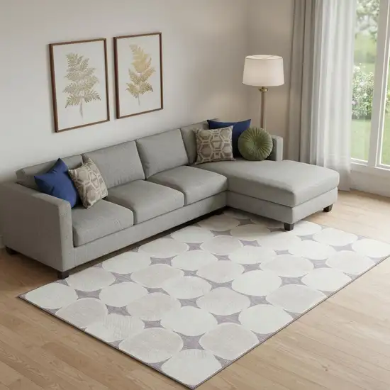 Lavender And Ivory Abstract Geometric Washable Area Rug With UV Protection Photo 1