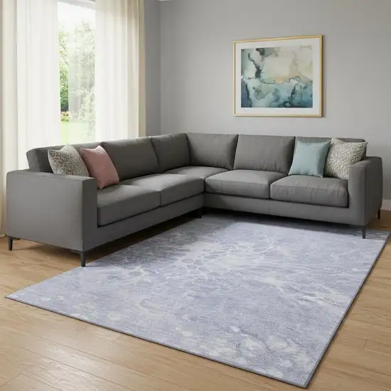 Lavender And Ivory Abstract Washable Area Rug With UV Protection Photo 1