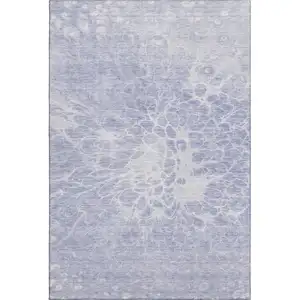 Photo of Lavender And Ivory Abstract Washable Area Rug With UV Protection