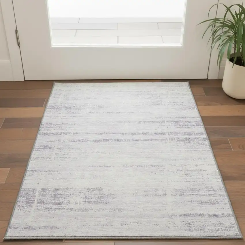 Lavender And Ivory Abstract Washable Area Rug With UV Protection Photo 2