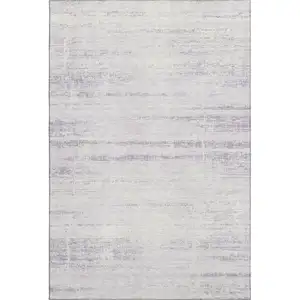 Photo of Lavender And Ivory Abstract Washable Area Rug With UV Protection