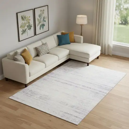 Lavender And Ivory Abstract Washable Area Rug With UV Protection Photo 1