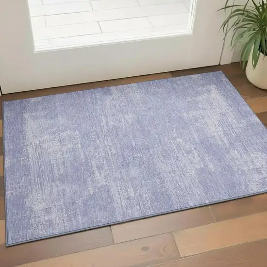 Lavender And Ivory Abstract Washable Area Rug With UV Protection Photo 1