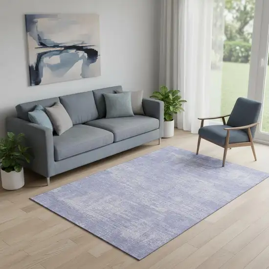 Lavender And Ivory Abstract Washable Area Rug With UV Protection Photo 1