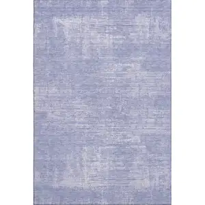 Photo of Lavender And Ivory Abstract Washable Area Rug With UV Protection