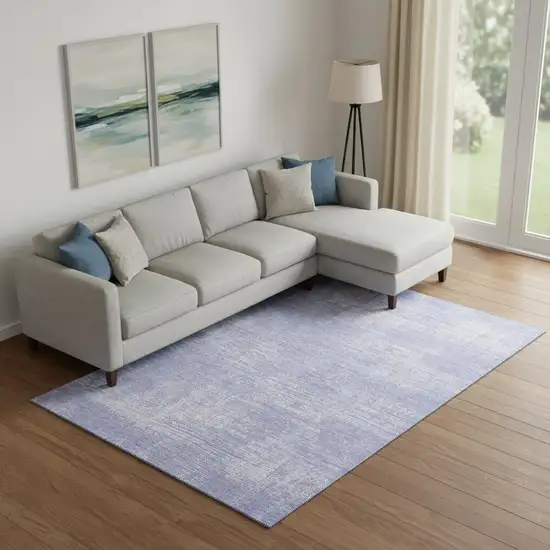 Lavender And Ivory Abstract Washable Area Rug With UV Protection Photo 1