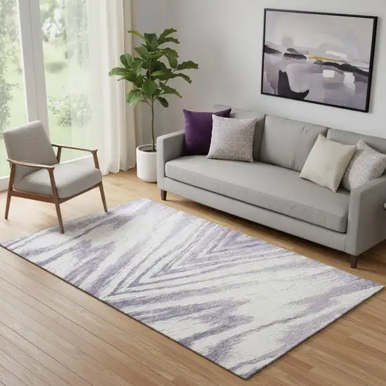 Lavender And Ivory Abstract Washable Area Rug With UV Protection Photo 1