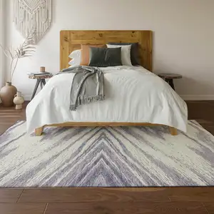 Photo of Lavender And Ivory Abstract Washable Area Rug With UV Protection