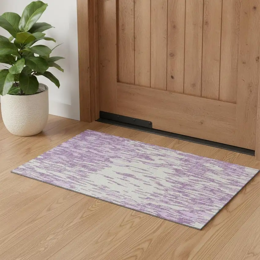 Lavender And Ivory Abstract Washable Area Rug With UV Protection Photo 1