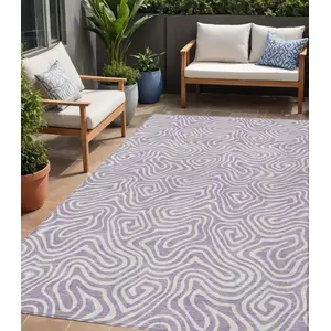Photo of Lavender And Ivory Abstract Washable Indoor Outdoor Area Rug