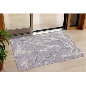Photo of Lavender And Ivory Abstract Washable Indoor Outdoor Area Rug