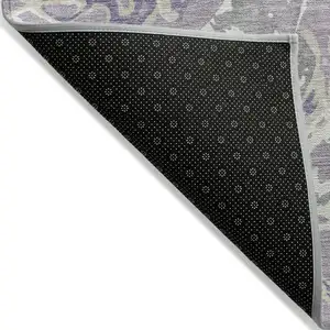 Photo of Lavender And Ivory Abstract Washable Indoor Outdoor Area Rug