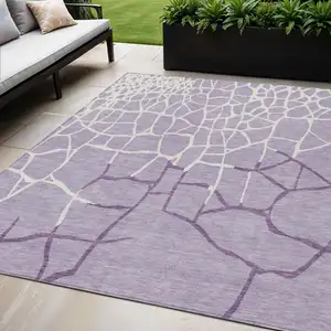 Photo of Lavender And Ivory Abstract Washable Indoor Outdoor Area Rug