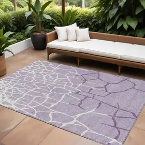 Photo of Lavender And Ivory Abstract Washable Indoor Outdoor Area Rug