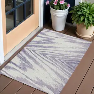 Photo of Lavender And Ivory Abstract Washable Indoor Outdoor Area Rug