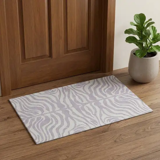 Lavender And Ivory Animal Print Washable Area Rug With UV Protection Photo 1