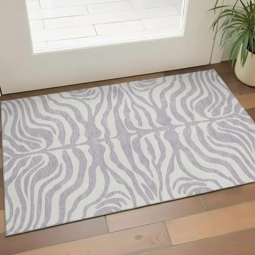 Lavender And Ivory Animal Print Washable Area Rug With UV Protection Photo 2