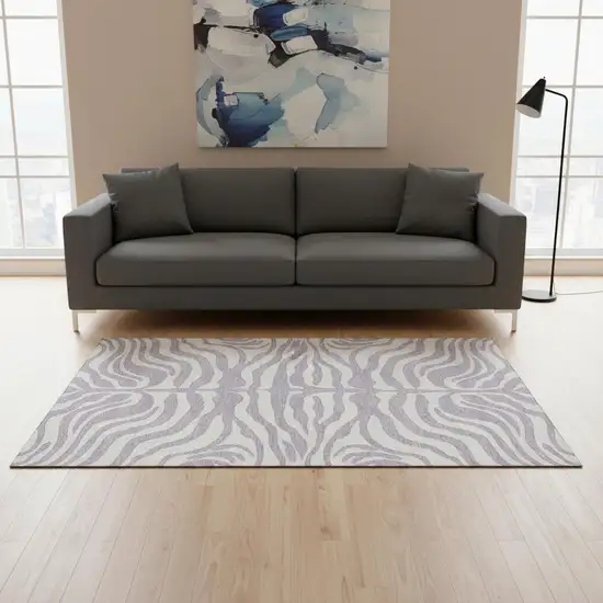 Lavender And Ivory Animal Print Washable Area Rug With UV Protection Photo 2