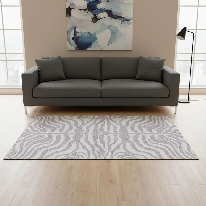 Lavender And Ivory Animal Print Washable Area Rug With UV Protection Photo 2