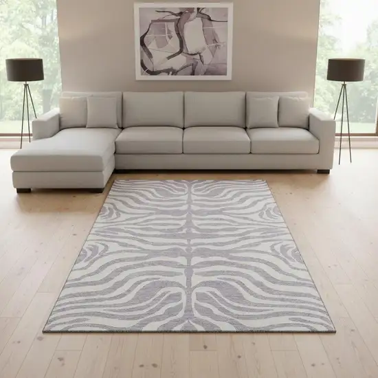 Lavender And Ivory Animal Print Washable Area Rug With UV Protection Photo 2