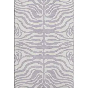 Photo of Lavender And Ivory Animal Print Washable Area Rug With UV Protection