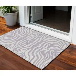 Photo of Lavender And Ivory Animal Print Washable Indoor Outdoor Area Rug