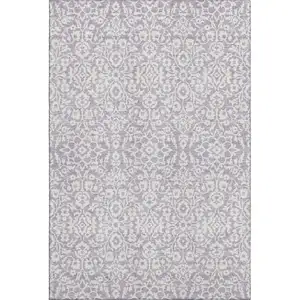 Photo of Lavender And Ivory Damask Washable Area Rug With UV Protection