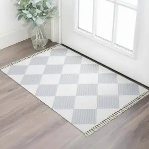 Photo of Lavender And Ivory Geometric Washable Area Rug With Fringe