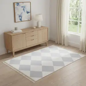 Photo of Lavender And Ivory Geometric Washable Area Rug With Fringe