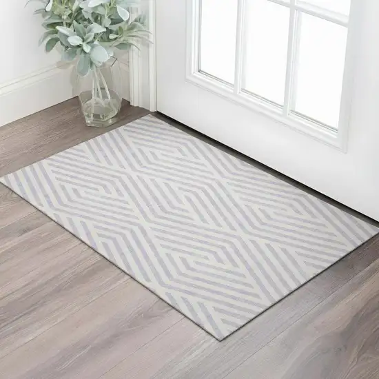 Lavender And Ivory Geometric Washable Area Rug With UV Protection Photo 1