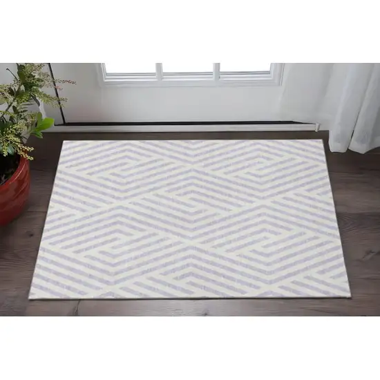 Lavender And Ivory Geometric Washable Area Rug With UV Protection Photo 2