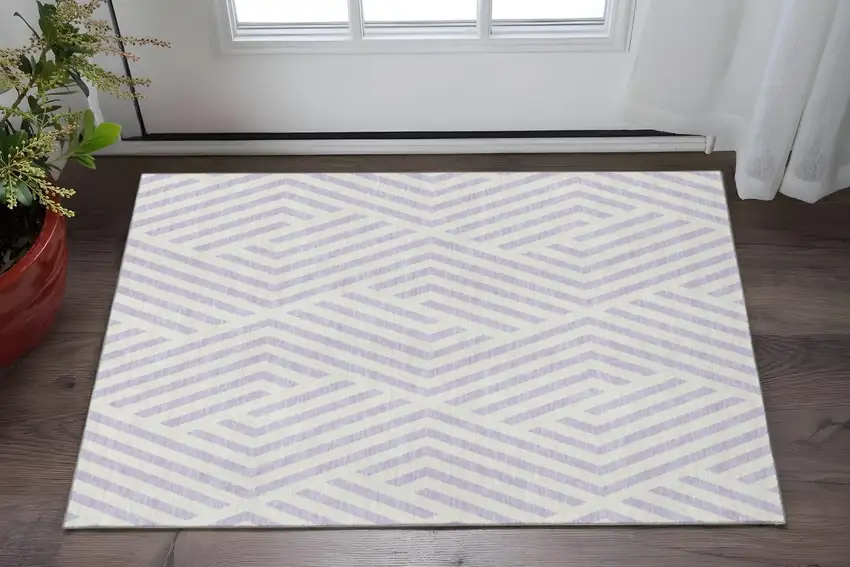 Lavender And Ivory Geometric Washable Area Rug With UV Protection Photo 2