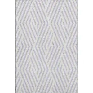 Photo of Lavender And Ivory Geometric Washable Area Rug With UV Protection